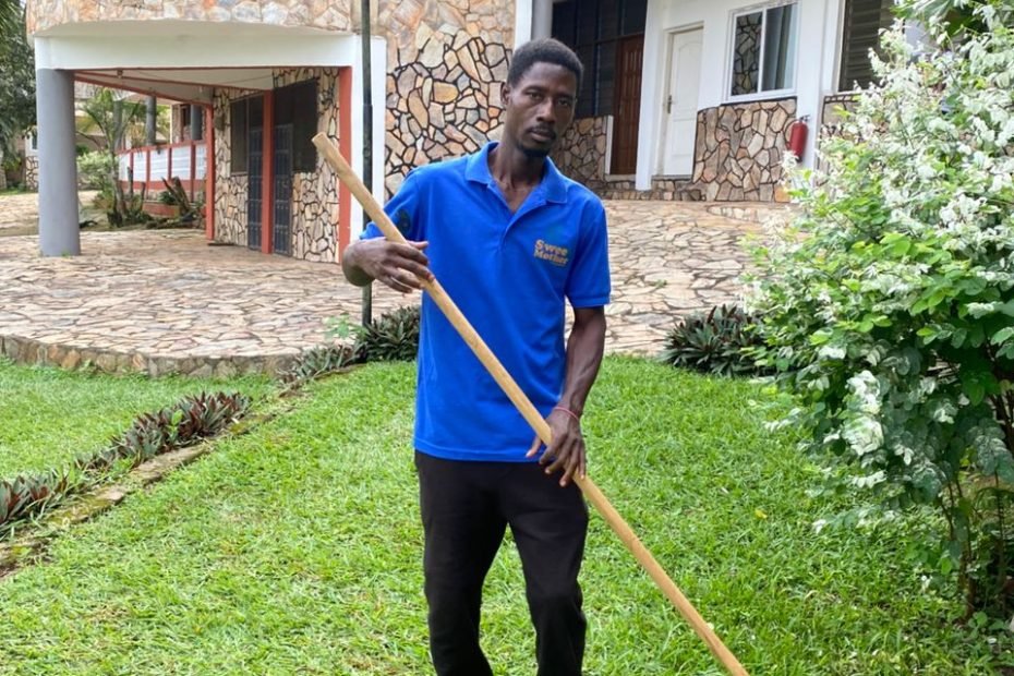 worker sweeping sweet mother